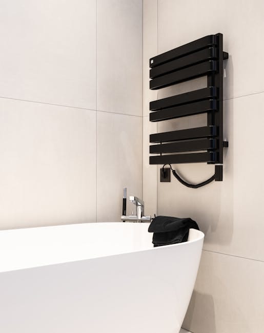 Полотенцесушитель: водяной или электрический